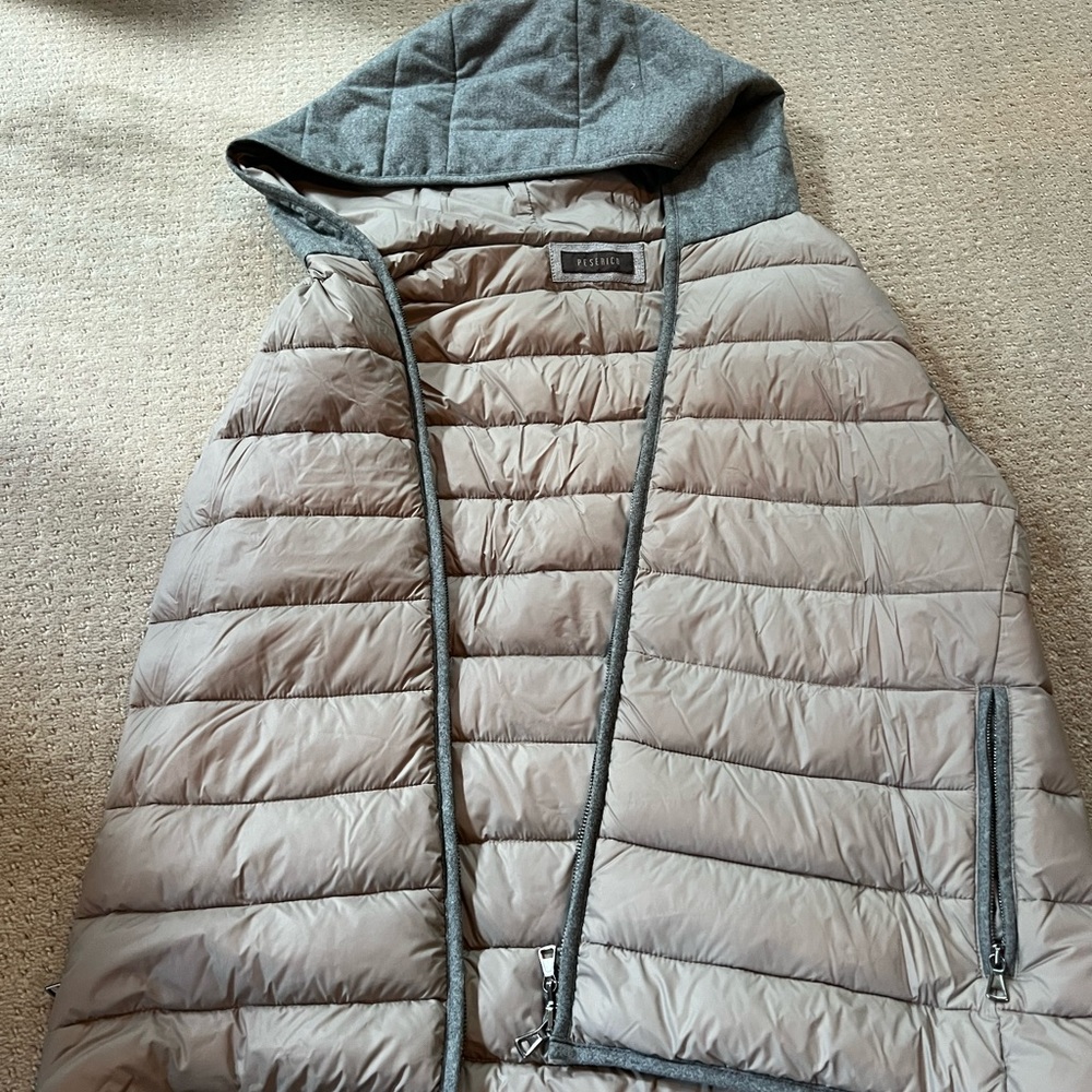A grey puffer vest